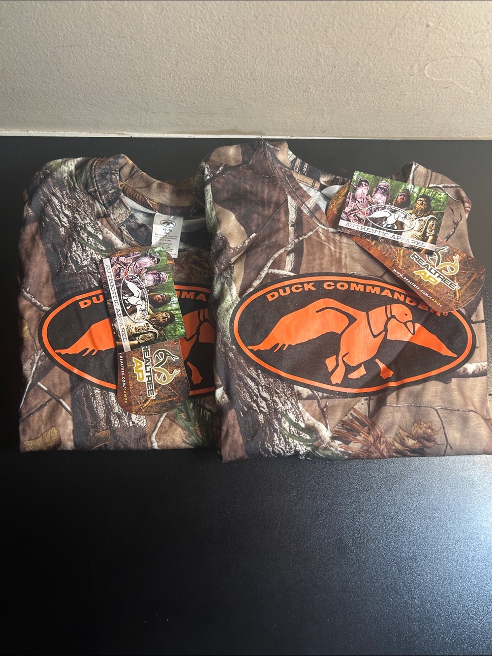 Two Realtree Camo Duck Commander Boys T-Shirts Size 4. Both New.